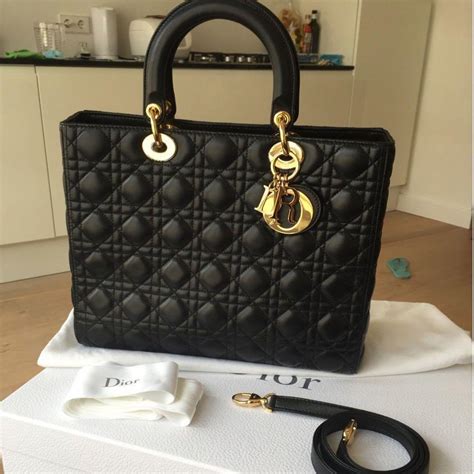 black office dest cristian dior|Dior Black leather bag.